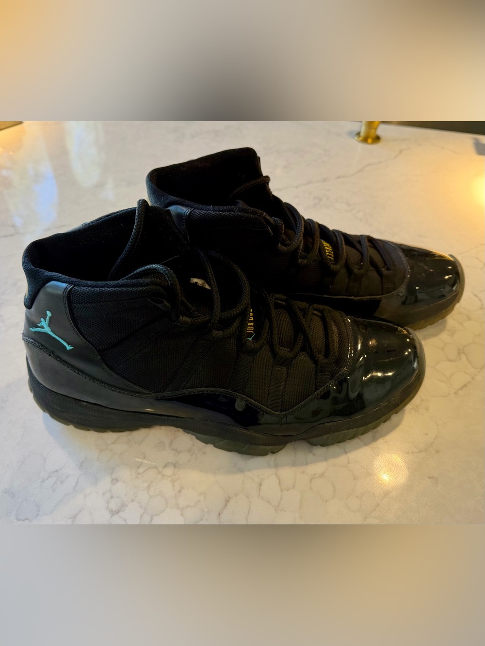 Jordan Men’s Black High-Top Patent Leather Sneakers